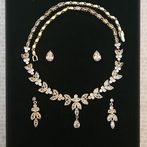 Brand New Gold And Pear Shaped Crystal Necklace And 2 Sets Matching Earrings
